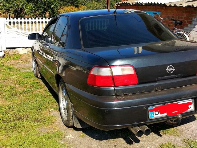 Чорний Опель Омега, об'ємом двигуна 2.5 л та пробігом 300 тис. км за 3400 $, фото 1 на Automoto.ua