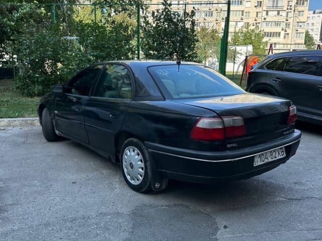 Чорний Опель Омега, об'ємом двигуна 2.5 л та пробігом 400 тис. км за 1351 $, фото 3 на Automoto.ua