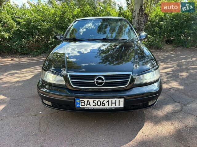 Черный Опель Омега, объемом двигателя 2.2 л и пробегом 340 тыс. км за 3250 $, фото 1 на Automoto.ua