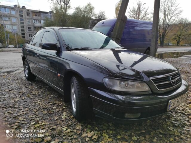 Черный Опель Омега, объемом двигателя 2.5 л и пробегом 3 тыс. км за 3200 $, фото 12 на Automoto.ua