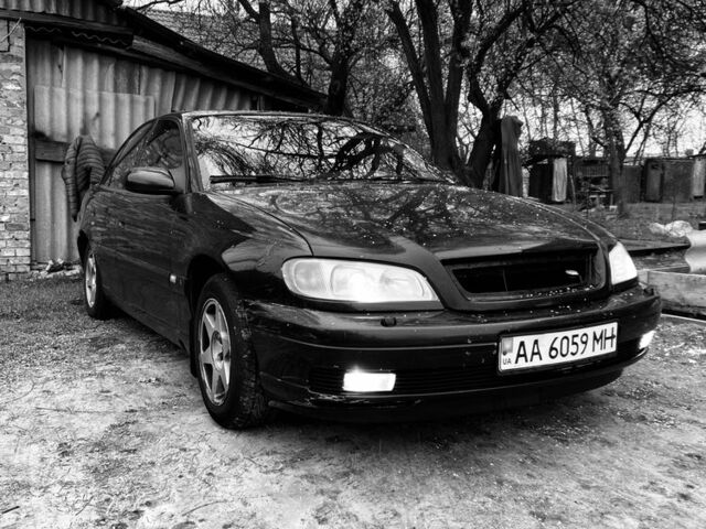 Чорний Опель Омега, об'ємом двигуна 2.5 л та пробігом 240 тис. км за 2800 $, фото 5 на Automoto.ua