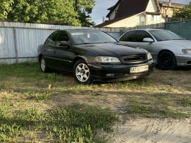 Чорний Опель Омега, об'ємом двигуна 2.5 л та пробігом 240 тис. км за 2800 $, фото 2 на Automoto.ua