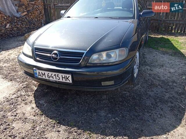 Черный Опель Омега, объемом двигателя 2.2 л и пробегом 330 тыс. км за 2500 $, фото 2 на Automoto.ua