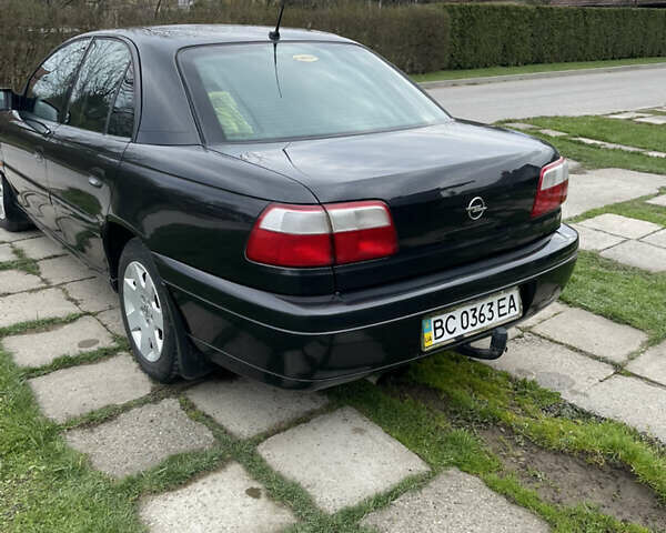 Чорний Опель Омега, об'ємом двигуна 2.2 л та пробігом 250 тис. км за 3900 $, фото 1 на Automoto.ua