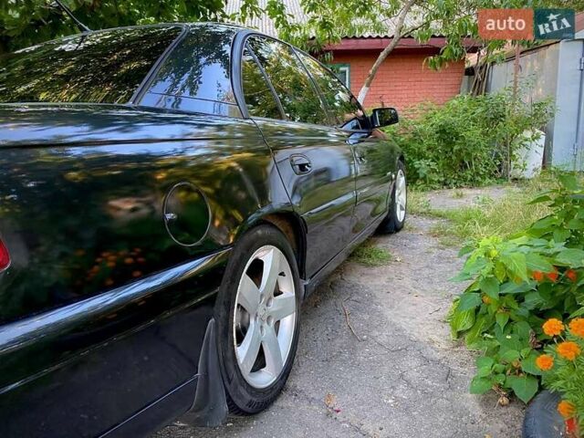 Черный Опель Омега, объемом двигателя 2.6 л и пробегом 434 тыс. км за 3500 $, фото 5 на Automoto.ua