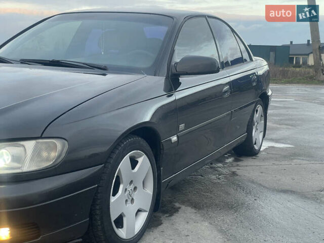 Черный Опель Омега, объемом двигателя 2.17 л и пробегом 374 тыс. км за 3100 $, фото 6 на Automoto.ua