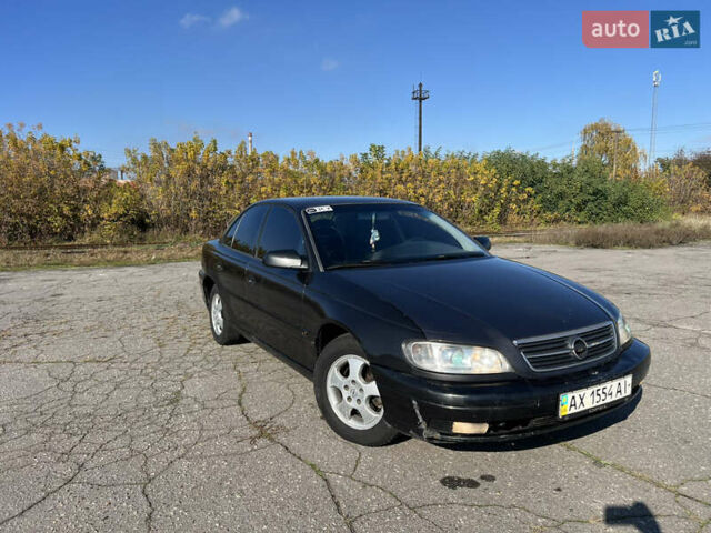 Опель Омега 2001 у Вінниці на Automoto.ua Чорний Опель Омега, об'ємом двигуна 2.2 л та пробігом 319 тис. км за 2000 $, фото 9 на Automoto.ua