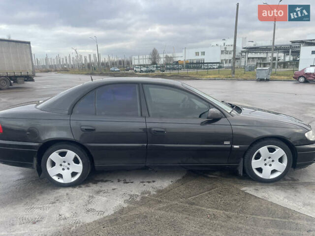 Черный Опель Омега, объемом двигателя 2.17 л и пробегом 374 тыс. км за 3100 $, фото 4 на Automoto.ua