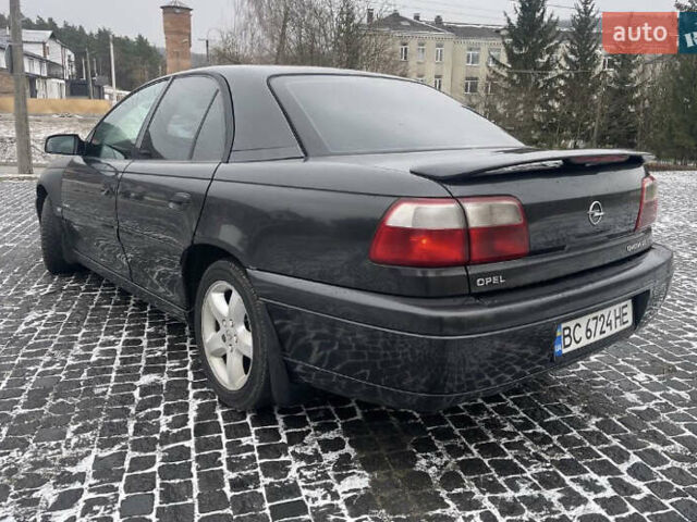 Черный Опель Омега, объемом двигателя 2.2 л и пробегом 450 тыс. км за 2550 $, фото 15 на Automoto.ua
