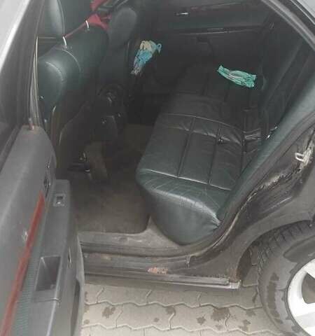 Черный Опель Омега, объемом двигателя 2.2 л и пробегом 355 тыс. км за 3700 $, фото 13 на Automoto.ua