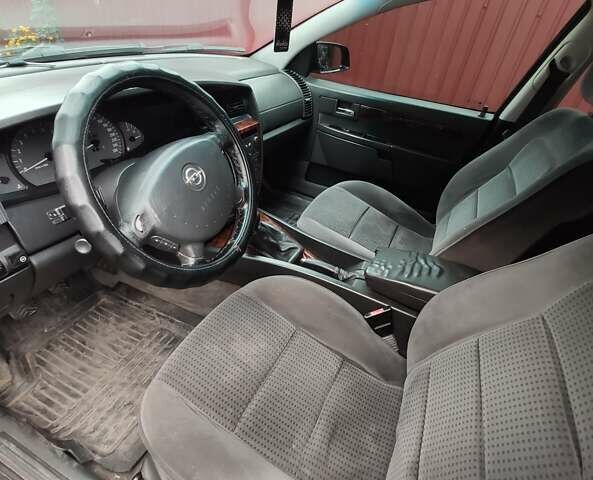 Черный Опель Омега, объемом двигателя 2.6 л и пробегом 434 тыс. км за 3500 $, фото 11 на Automoto.ua