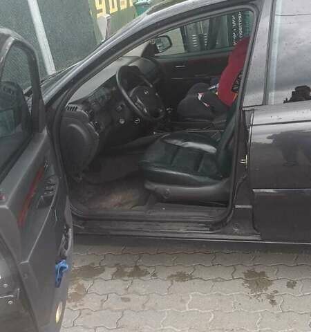 Черный Опель Омега, объемом двигателя 2.2 л и пробегом 355 тыс. км за 3700 $, фото 9 на Automoto.ua
