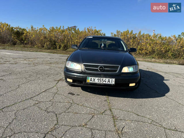 Опель Омега 2001 у Вінниці на Automoto.ua Чорний Опель Омега, об'ємом двигуна 2.2 л та пробігом 319 тис. км за 2000 $, фото 2 на Automoto.ua
