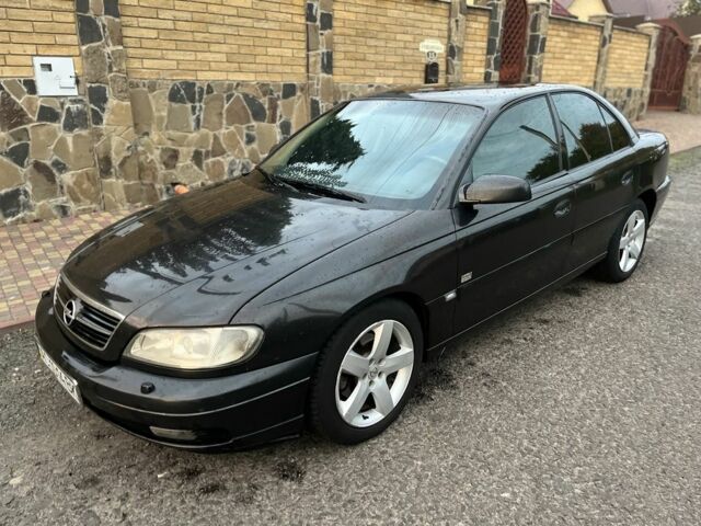 Чорний Опель Омега, об'ємом двигуна 2.2 л та пробігом 300 тис. км за 2700 $, фото 1 на Automoto.ua