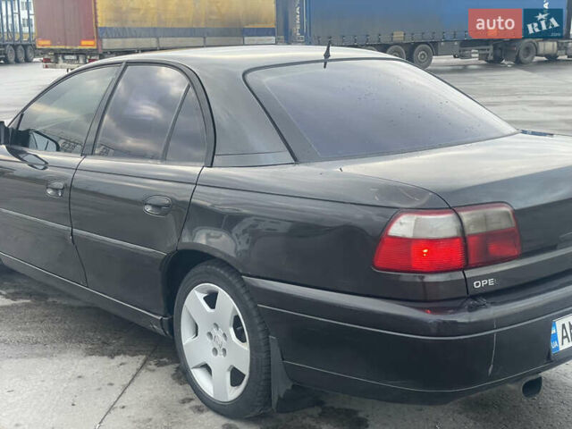 Черный Опель Омега, объемом двигателя 2.17 л и пробегом 374 тыс. км за 3100 $, фото 7 на Automoto.ua