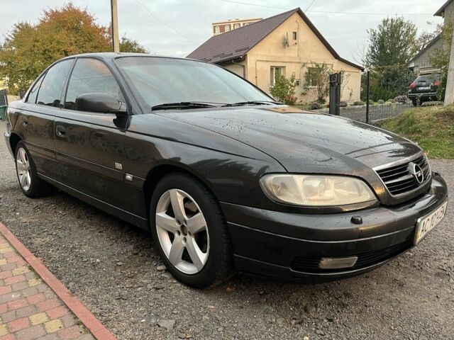 Чорний Опель Омега, об'ємом двигуна 2.2 л та пробігом 300 тис. км за 2700 $, фото 4 на Automoto.ua