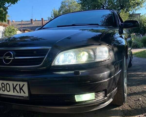 Черный Опель Омега, объемом двигателя 2.6 л и пробегом 434 тыс. км за 3500 $, фото 8 на Automoto.ua