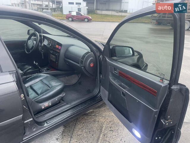 Черный Опель Омега, объемом двигателя 2.17 л и пробегом 374 тыс. км за 3100 $, фото 11 на Automoto.ua