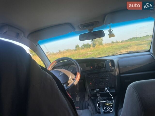 Черный Опель Омега, объемом двигателя 2.2 л и пробегом 336 тыс. км за 1700 $, фото 13 на Automoto.ua