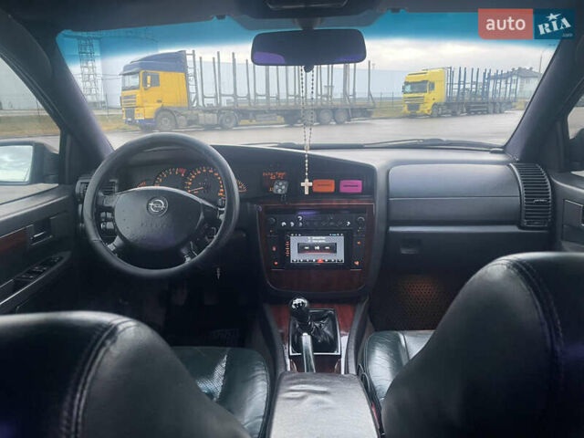 Черный Опель Омега, объемом двигателя 2.17 л и пробегом 374 тыс. км за 3100 $, фото 10 на Automoto.ua