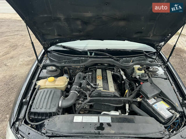 Черный Опель Омега, объемом двигателя 2.2 л и пробегом 319 тыс. км за 2000 $, фото 20 на Automoto.ua