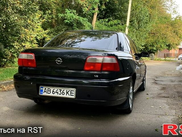 Черный Опель Омега, объемом двигателя 3 л и пробегом 250 тыс. км за 3100 $, фото 5 на Automoto.ua