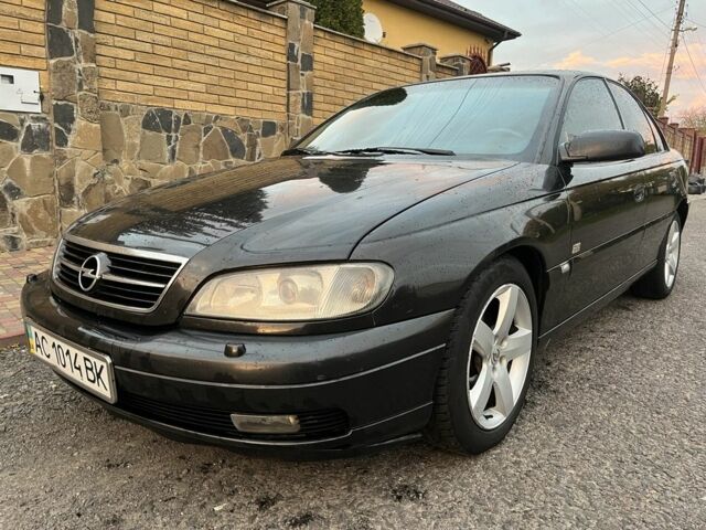 Чорний Опель Омега, об'ємом двигуна 2.2 л та пробігом 300 тис. км за 2700 $, фото 6 на Automoto.ua