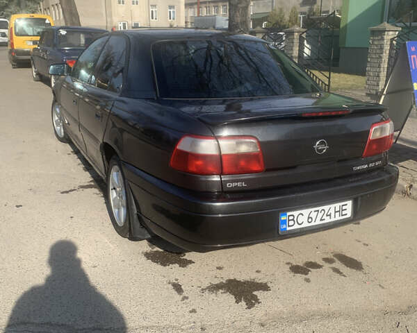 Черный Опель Омега, объемом двигателя 2.2 л и пробегом 450 тыс. км за 2550 $, фото 12 на Automoto.ua