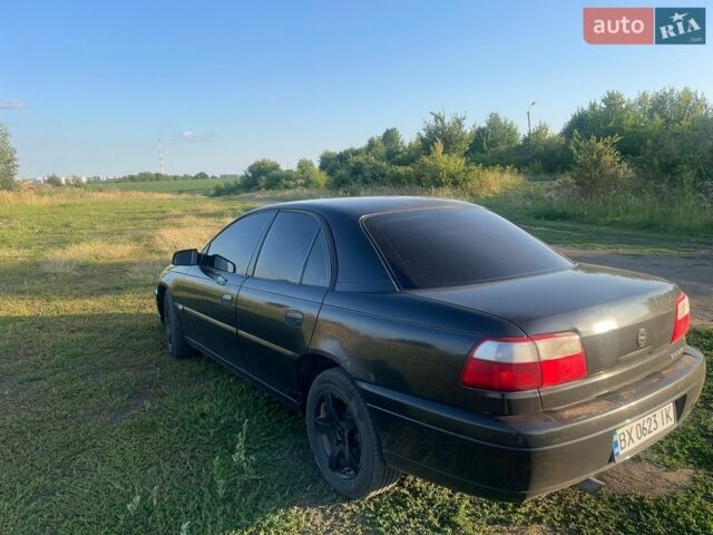 Черный Опель Омега, объемом двигателя 2.2 л и пробегом 336 тыс. км за 1700 $, фото 4 на Automoto.ua