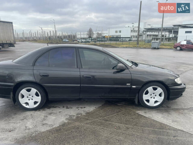 Черный Опель Омега, объемом двигателя 2.17 л и пробегом 374 тыс. км за 3100 $, фото 5 на Automoto.ua