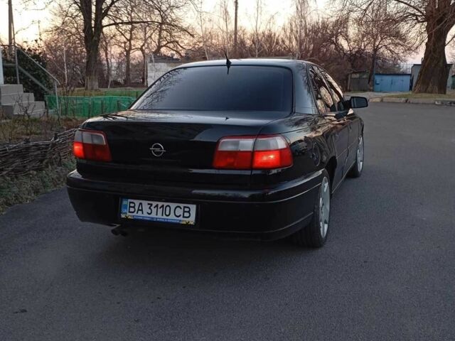 Чорний Опель Омега, об'ємом двигуна 2.6 л та пробігом 260 тис. км за 3100 $, фото 1 на Automoto.ua