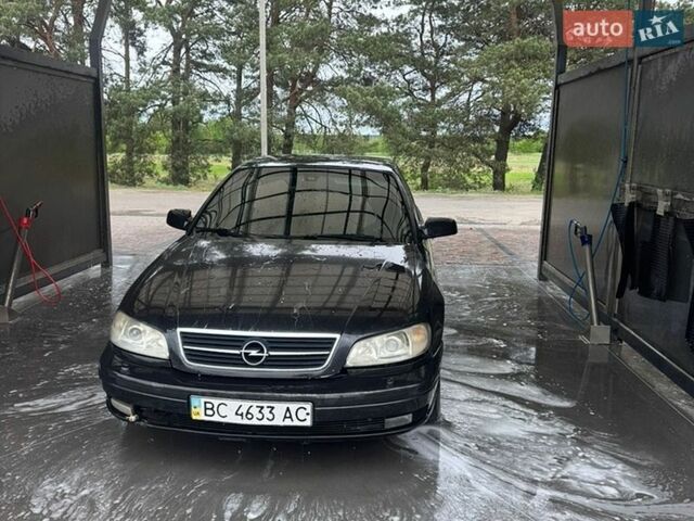 Черный Опель Омега, объемом двигателя 2.5 л и пробегом 390 тыс. км за 3250 $, фото 2 на Automoto.ua