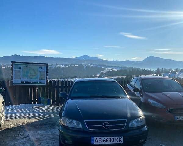 Черный Опель Омега, объемом двигателя 2.6 л и пробегом 434 тыс. км за 3500 $, фото 1 на Automoto.ua