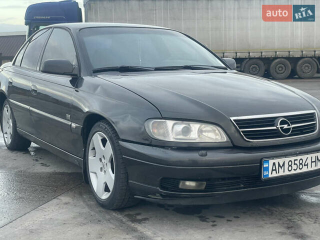 Черный Опель Омега, объемом двигателя 2.17 л и пробегом 374 тыс. км за 3100 $, фото 3 на Automoto.ua