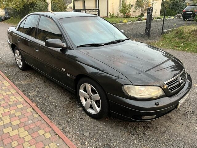 Чорний Опель Омега, об'ємом двигуна 2.2 л та пробігом 300 тис. км за 2700 $, фото 2 на Automoto.ua