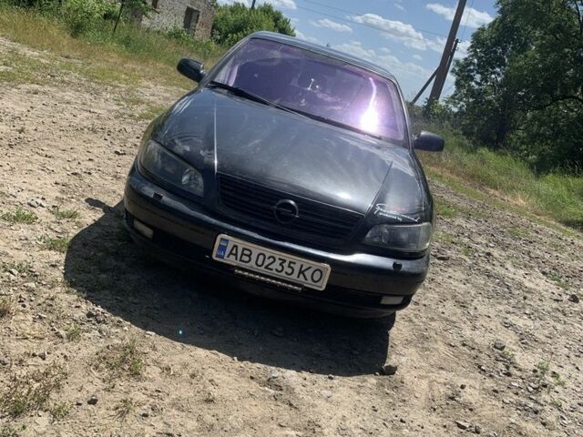 Черный Опель Омега, объемом двигателя 2.2 л и пробегом 371 тыс. км за 3500 $, фото 4 на Automoto.ua