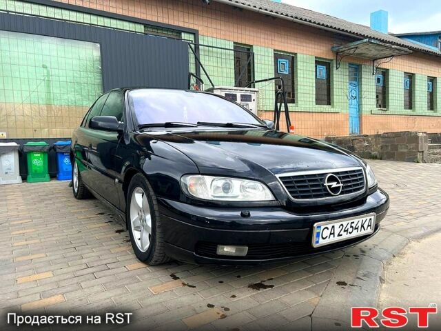 Черный Опель Омега, объемом двигателя 2.5 л и пробегом 280 тыс. км за 4500 $, фото 4 на Automoto.ua