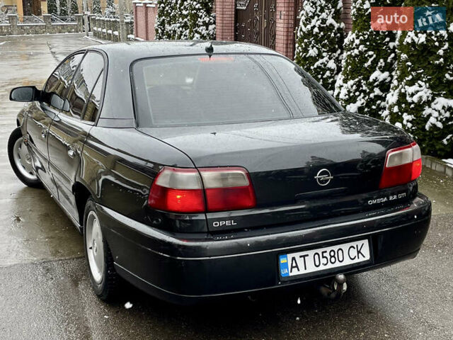 Черный Опель Омега, объемом двигателя 2.2 л и пробегом 290 тыс. км за 2350 $, фото 27 на Automoto.ua