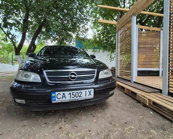 Черный Опель Омега, объемом двигателя 2.5 л и пробегом 300 тыс. км за 4000 $, фото 7 на Automoto.ua