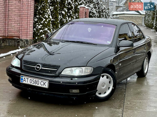 Черный Опель Омега, объемом двигателя 2.2 л и пробегом 290 тыс. км за 2350 $, фото 22 на Automoto.ua