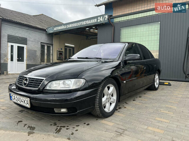 Черный Опель Омега, объемом двигателя 2.5 л и пробегом 280 тыс. км за 4300 $, фото 2 на Automoto.ua