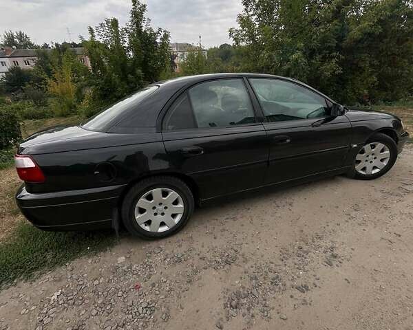 Черный Опель Омега, объемом двигателя 2.17 л и пробегом 330 тыс. км за 3300 $, фото 2 на Automoto.ua