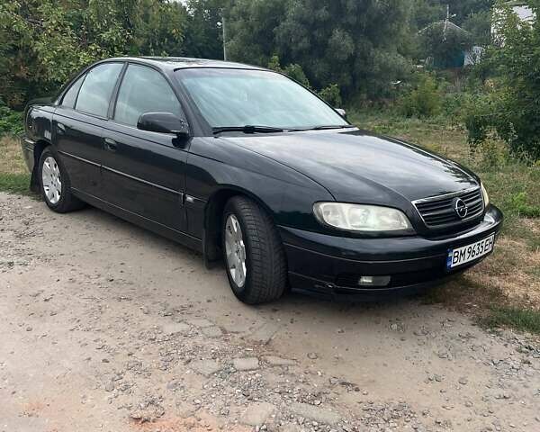 Черный Опель Омега, объемом двигателя 2.17 л и пробегом 330 тыс. км за 3300 $, фото 7 на Automoto.ua