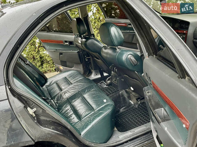 Черный Опель Омега, объемом двигателя 2.2 л и пробегом 290 тыс. км за 2350 $, фото 6 на Automoto.ua