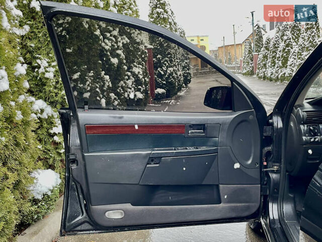 Черный Опель Омега, объемом двигателя 2.2 л и пробегом 290 тыс. км за 2350 $, фото 12 на Automoto.ua