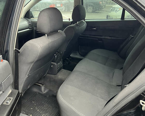 Черный Опель Омега, объемом двигателя 2.2 л и пробегом 320 тыс. км за 2999 $, фото 4 на Automoto.ua