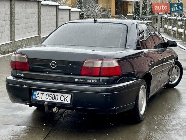 Черный Опель Омега, объемом двигателя 2.2 л и пробегом 290 тыс. км за 2350 $, фото 3 на Automoto.ua