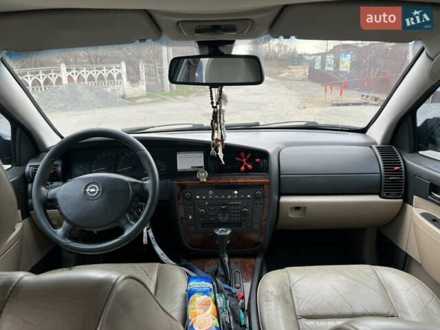 Черный Опель Омега, объемом двигателя 2.5 л и пробегом 280 тыс. км за 4300 $, фото 5 на Automoto.ua