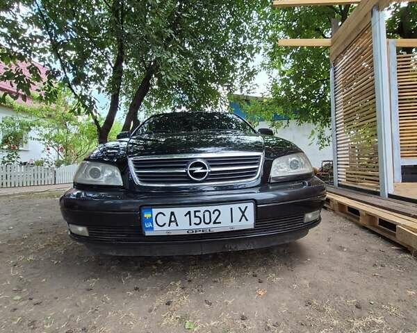 Черный Опель Омега, объемом двигателя 2.5 л и пробегом 300 тыс. км за 4000 $, фото 2 на Automoto.ua
