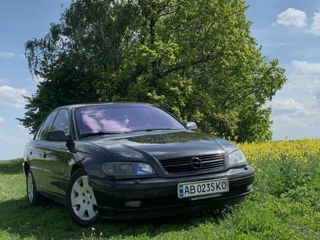 Черный Опель Омега, объемом двигателя 2.2 л и пробегом 371 тыс. км за 3500 $, фото 17 на Automoto.ua